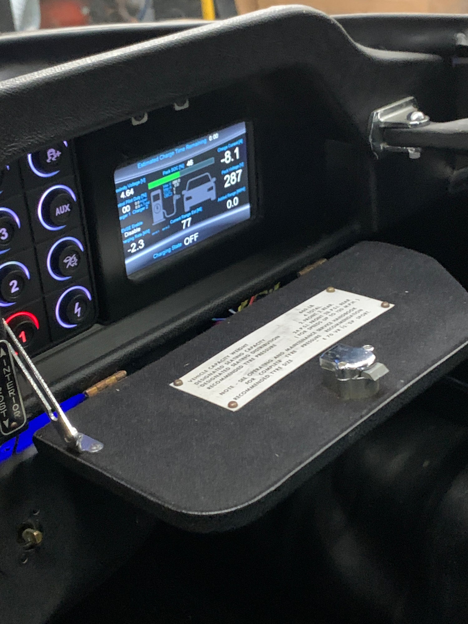 Custom EV interface, integrated into vehicle's glovebox