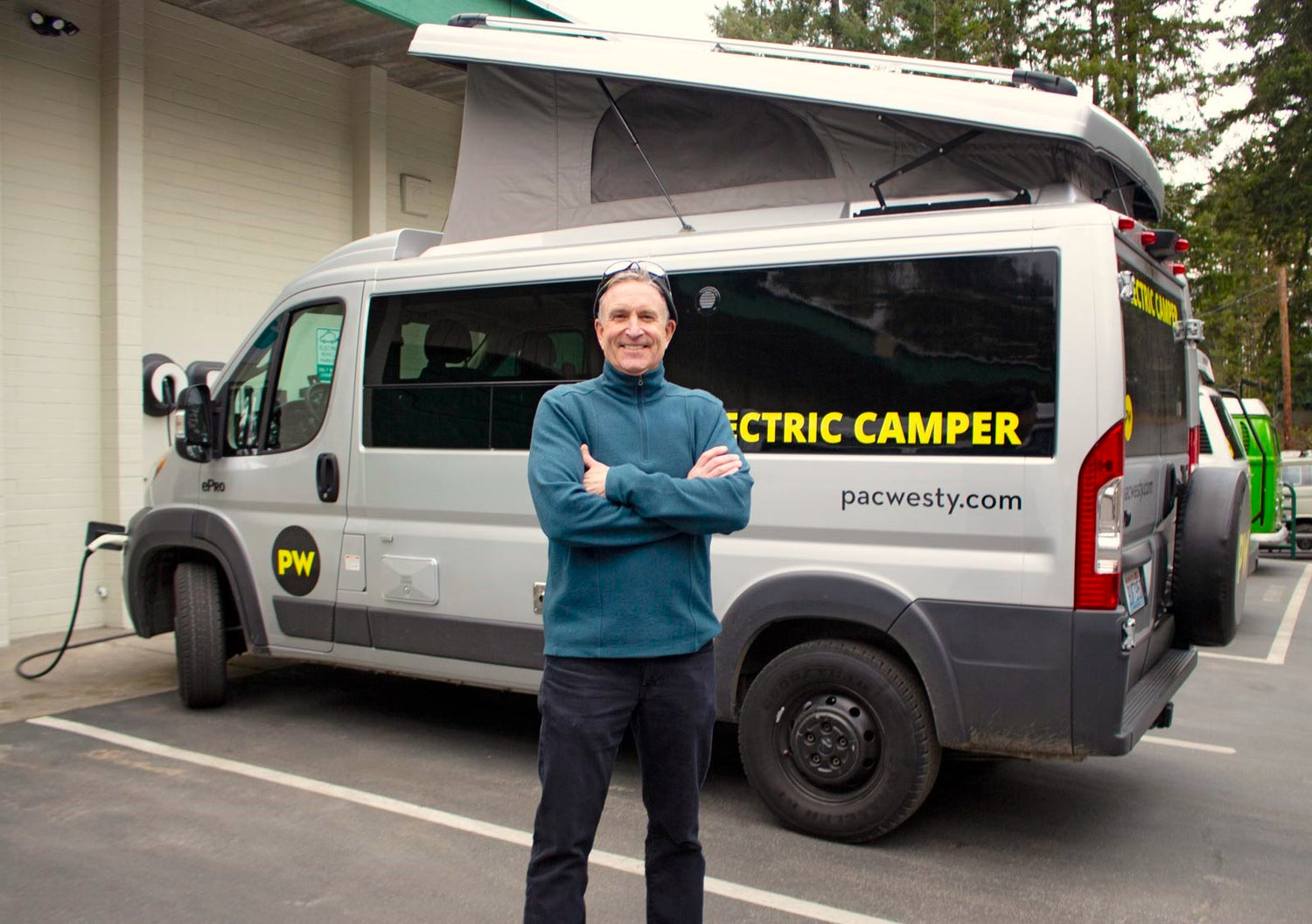 Greg shows off one of Pac Westy's EV camper vans
